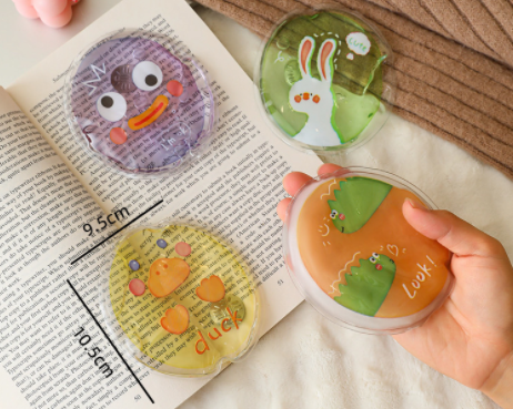 Children's cartoon hand warmer, portable and self heating, with a pocket for primary and secondary school students to keep warm